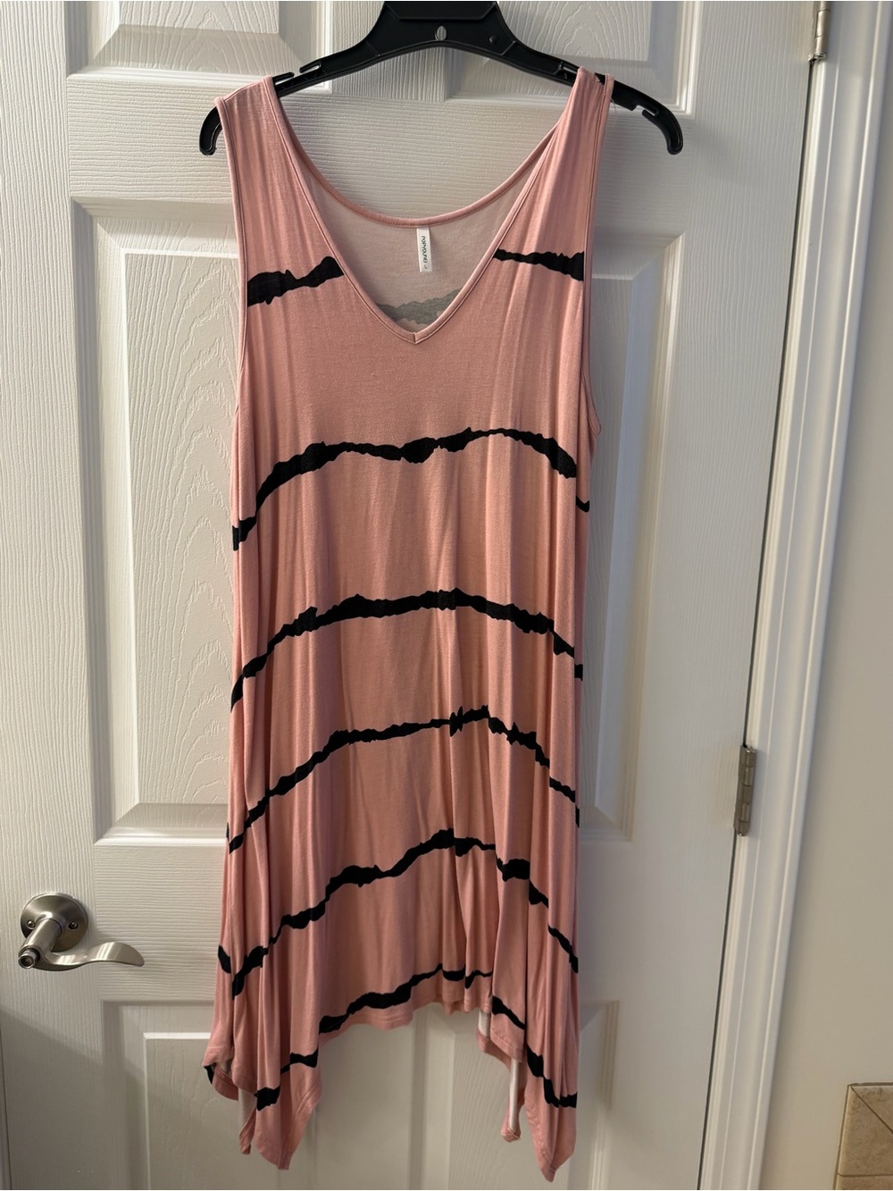 Pink with black horizontal stripes flowy tank top 
Size Large